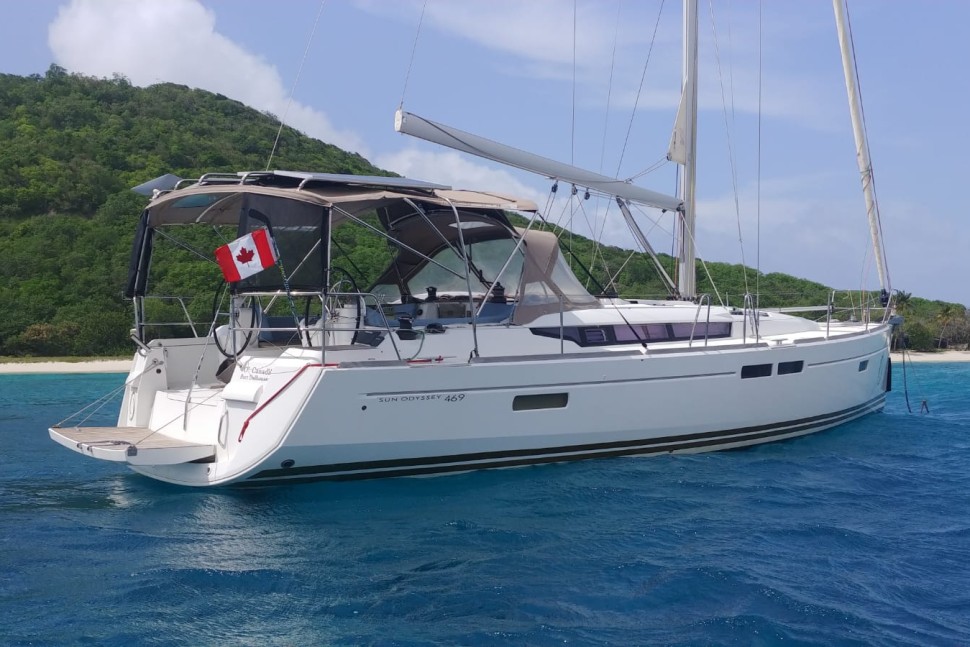 jeanneau sun odyssey 469 02 anchored stern canadian flag